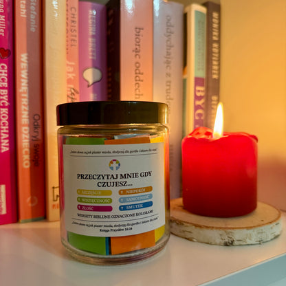 sloik z cytatami biblijnymi i świeczka